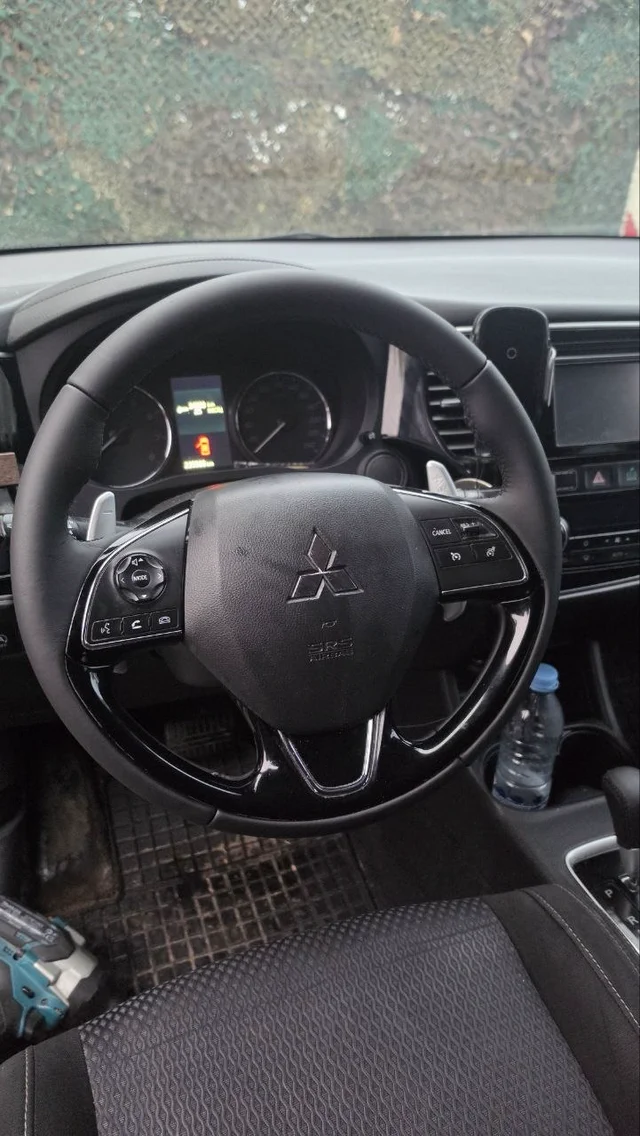 Steering wheel retrim, Mitsubishi, after